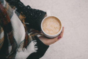 Coffee in hand on a snowy day.